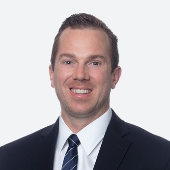 Photo of Joshua L. Rayes.